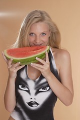 Image showing Woman with melon