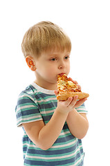 Image showing Little Boy Eating Pizza