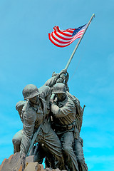 Image showing American flag carried by soldiers