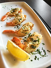 Image showing Grilled shrimps on a white plate