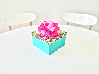 Image showing Colorful gift box on white table