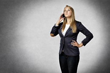 Image showing Businesswoman phoned mobile