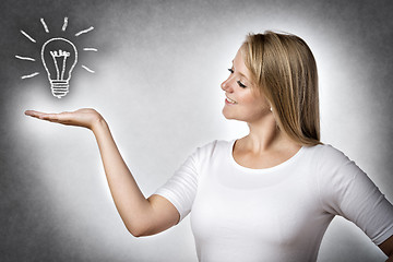 Image showing Creative woman with bulb