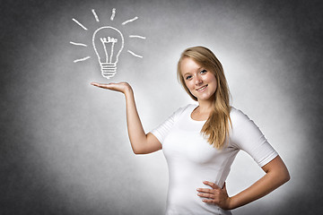 Image showing Creative woman with bulb