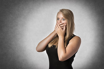 Image showing Blond anxiously woman