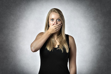 Image showing Blond anxiously woman