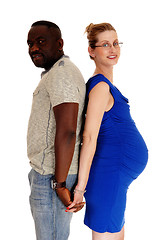 Image showing Pregnant couple back to back.