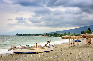 Image showing Reed umbrellas on the beach