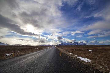 Image showing Snowy volcano landscape with dramatic clouds in Iceland