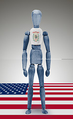 Image showing Wood figure mannequin with US state flag bodypaint - West Virgin