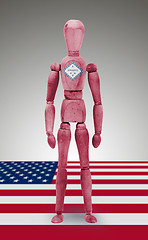 Image showing Wood figure mannequin with US state flag bodypaint - Arkansas