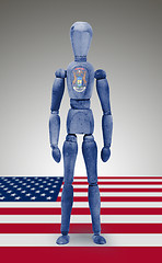 Image showing Wood figure mannequin with US state flag bodypaint - Michigan