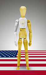 Image showing Wood figure mannequin with US state flag bodypaint - Rhode Islan