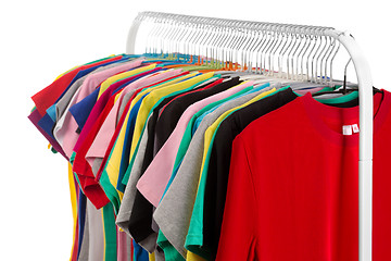 Image showing Colored shirts on hangers steel.