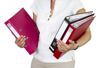 Image showing Secretary holding binders