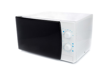 Image showing New microwave oven with analog control.