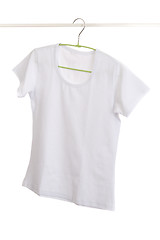 Image showing white t-shirt on hanger.