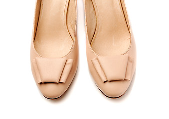 Image showing Pair of women\'s shoes leather beige closeup.