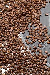 Image showing Coffee beans and vintage vinyl record