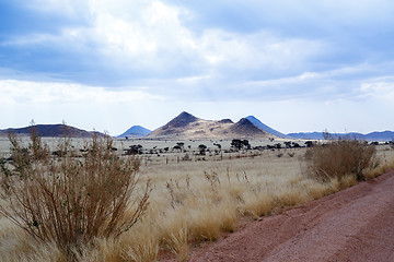 Image showing endless road in Namibia moonscape landscape