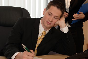 Image showing Businessman writing