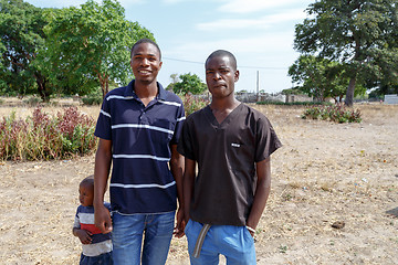 Image showing namibian boys with small child