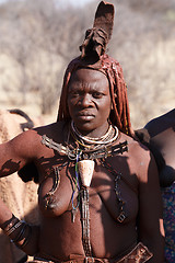 Image showing Himba woman with ornament on the neck in the village