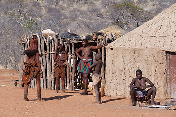 Image showing Himba and zemba woman with ornaments on the neck in the village