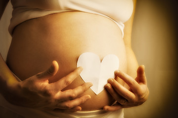 Image showing baby bump with paper heart