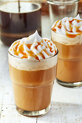 Image showing two glasses of coffee with whipped cream