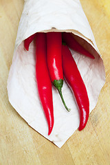 Image showing red hot chili peppers in paper bags