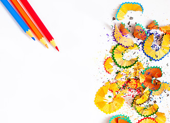 Image showing colored shavings and pencils on white