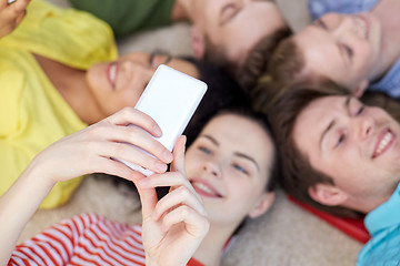 Image showing close up of students or friends with smartphones