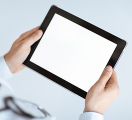 Image showing male doctor holding tablet pc