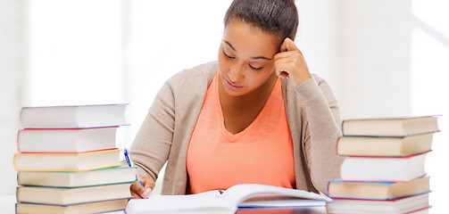 Image showing international student studying in college