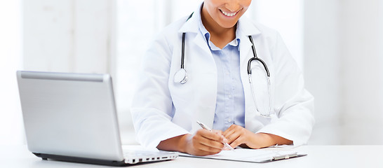 Image showing female doctor with laptop pc