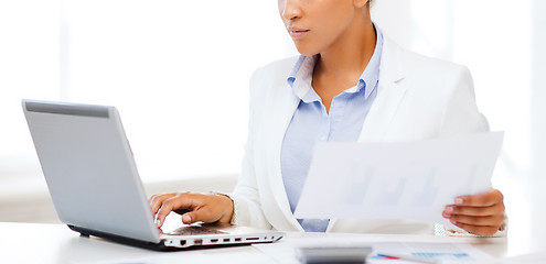 Image showing businesswoman working with computer in office