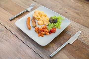 Image showing plate of different food on table