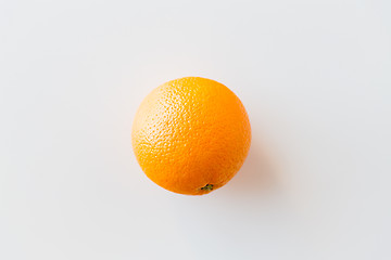 Image showing ripe orange over white