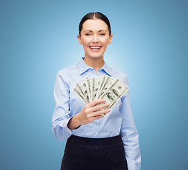 Image showing businesswoman with dollar cash money