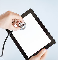 Image showing doctor with stethoscope and tablet pc