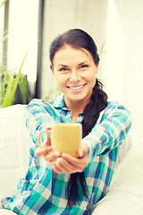 Image showing lovely housewife with mug