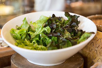 Image showing bowl of green salad lettuce at asian restaurant