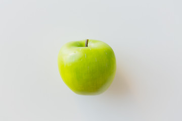 Image showing ripe green apple over white