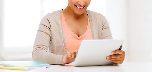 Image showing smiling student girl with tablet pc