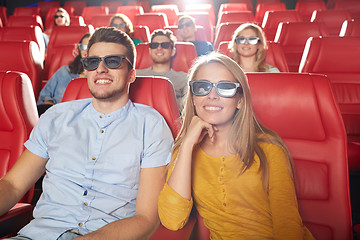 Image showing happy friends watching movie in 3d theater