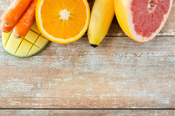 Image showing close up of fresh juicy fruits on table