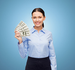 Image showing businesswoman with dollar cash money