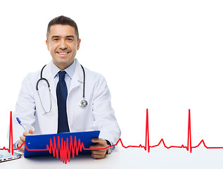 Image showing happy doctor with clipboard and cardiogram pattern