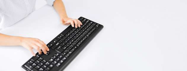 Image showing student girls hands typing on keyboard